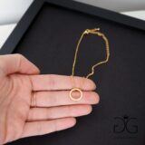 GG UNIQUE GOLD CIRCLE KARMA NECKLACE