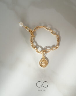 Stainless steel bracelet with freshwater pearl and sun symbol - GG UNIQUE