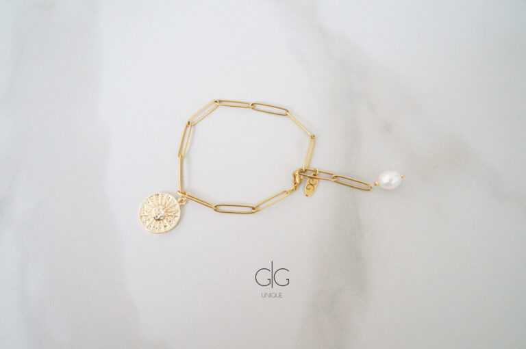 Stainless steel bracelet with freshwater pearl and sun symbol - GG UNIQUE