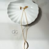 Gold color necklace with a large shell - GG UNIQUE