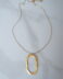 Minimal long necklace with a large oval ring - GG UNIQUE