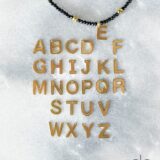 Black crystal necklace with initial letter pendant