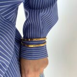 Thick stainless steel bangle bracelet in gold - GG UNIQUE