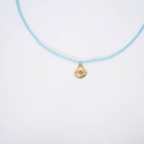 Blue necklace with gold shell - GG Unique