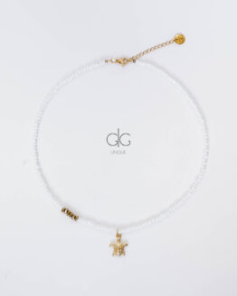 White necklace with gold turtle - GG Unique