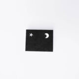 Asymmetrical star and moon earrings in silver