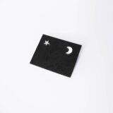 Asymmetrical star and moon earrings in silver