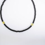 Unisex black stone smile necklace