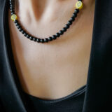 Unisex black stone smile necklace