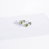 Silver ring with moss green zircon