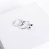 Silver ring with moss green zircon