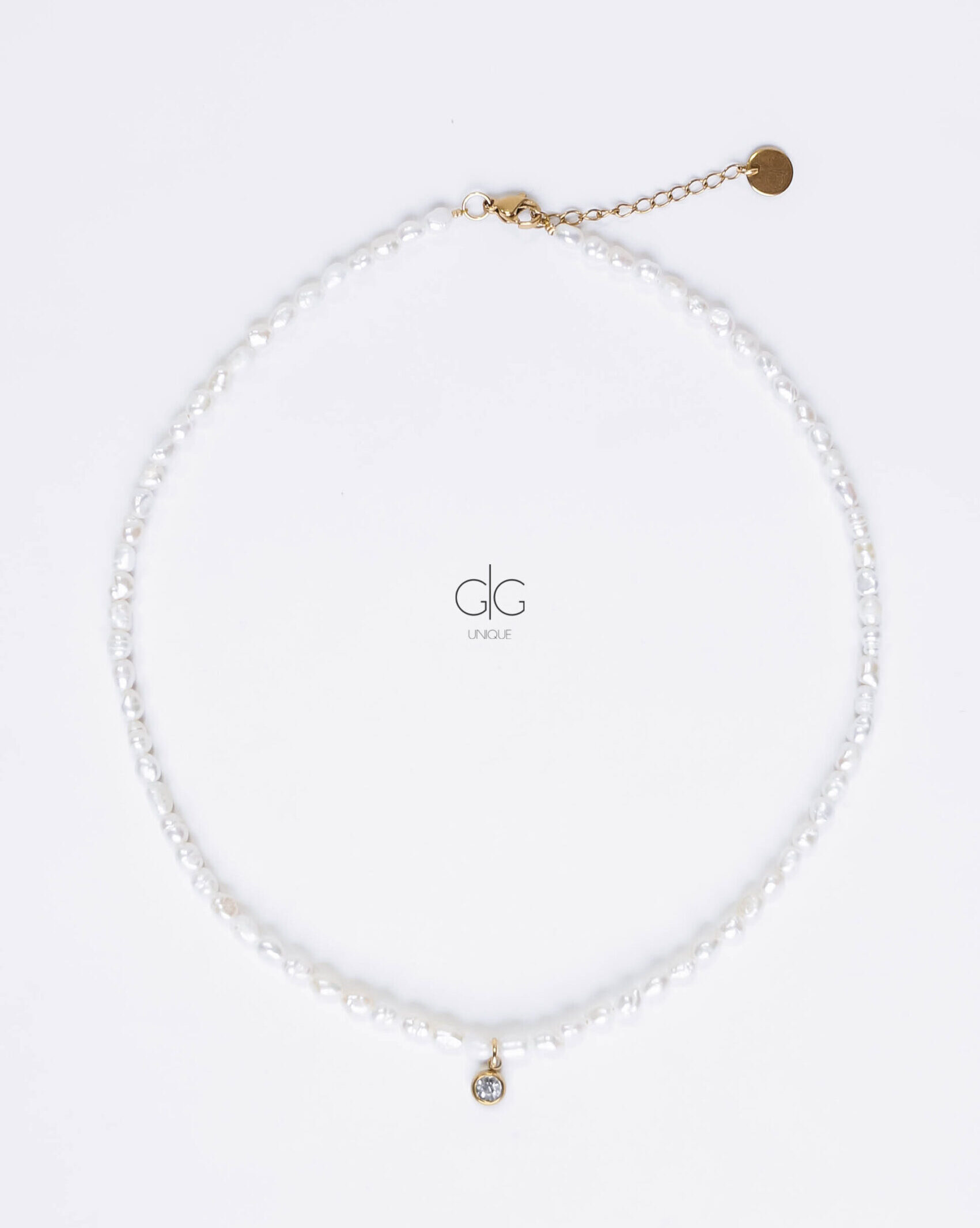 Pearl necklace with mini zircon pendant