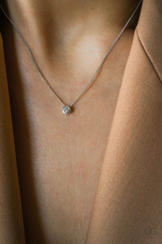 Classic silver necklace with a zircon