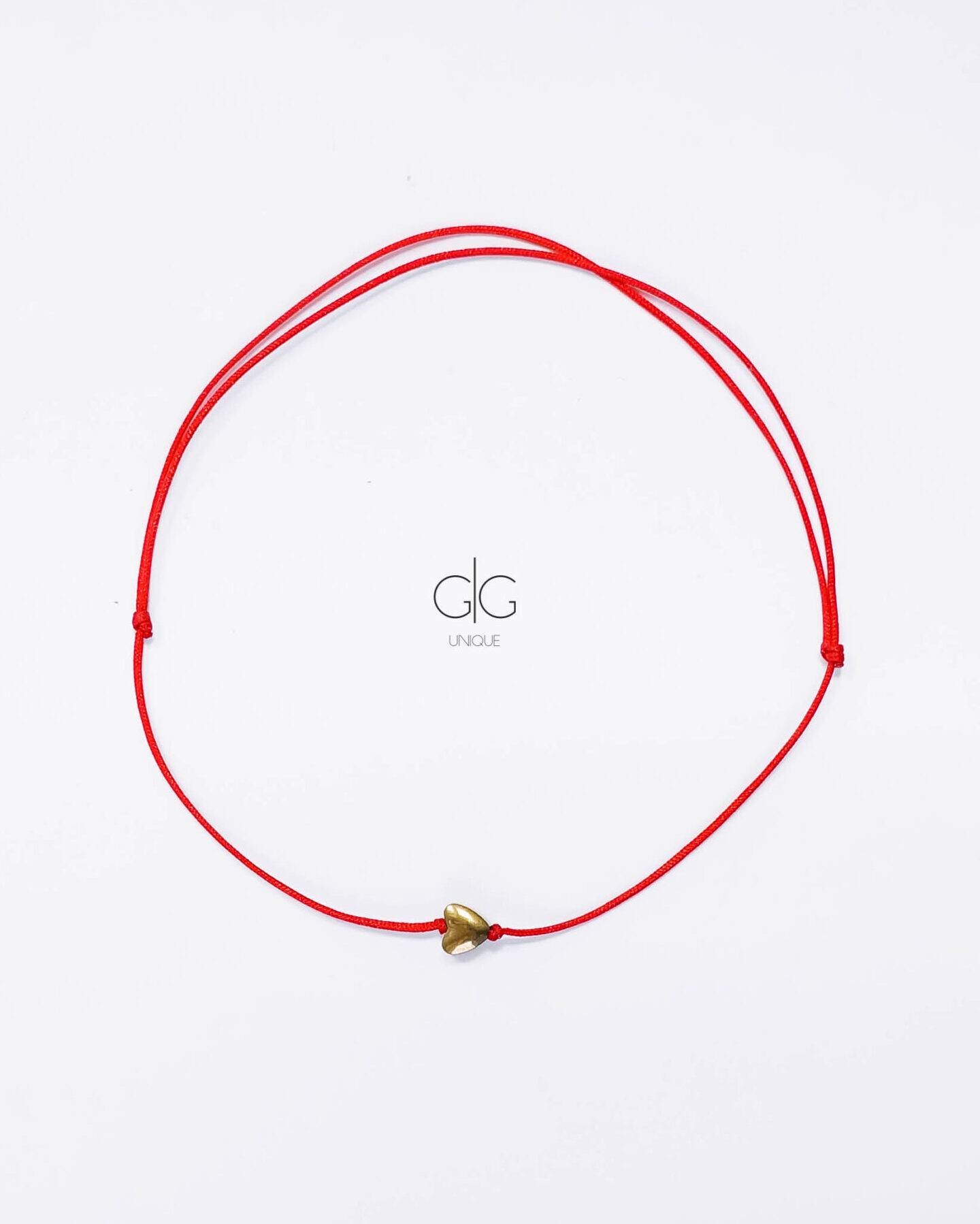 Red string with heart