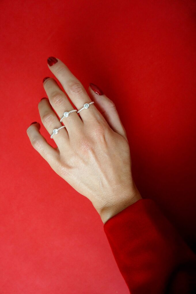 Twisted silver ring with zircon